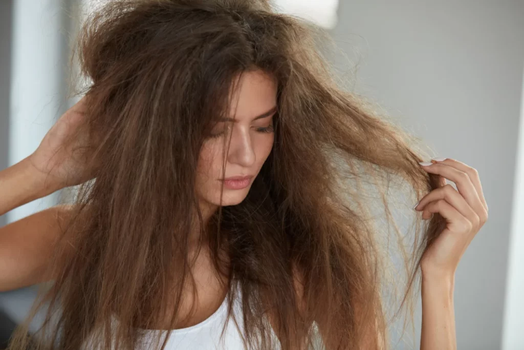 A woman with damaged hair