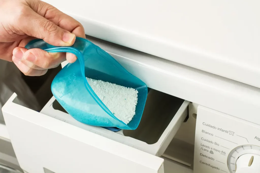 Adding washing powder into a washer