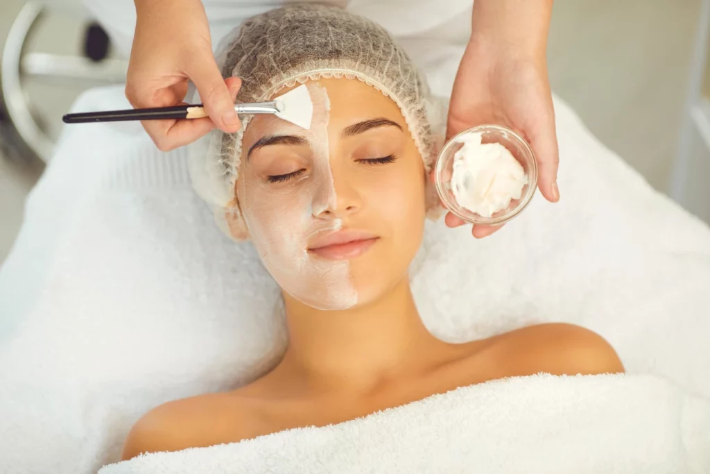 A lady doing skin care in a spa